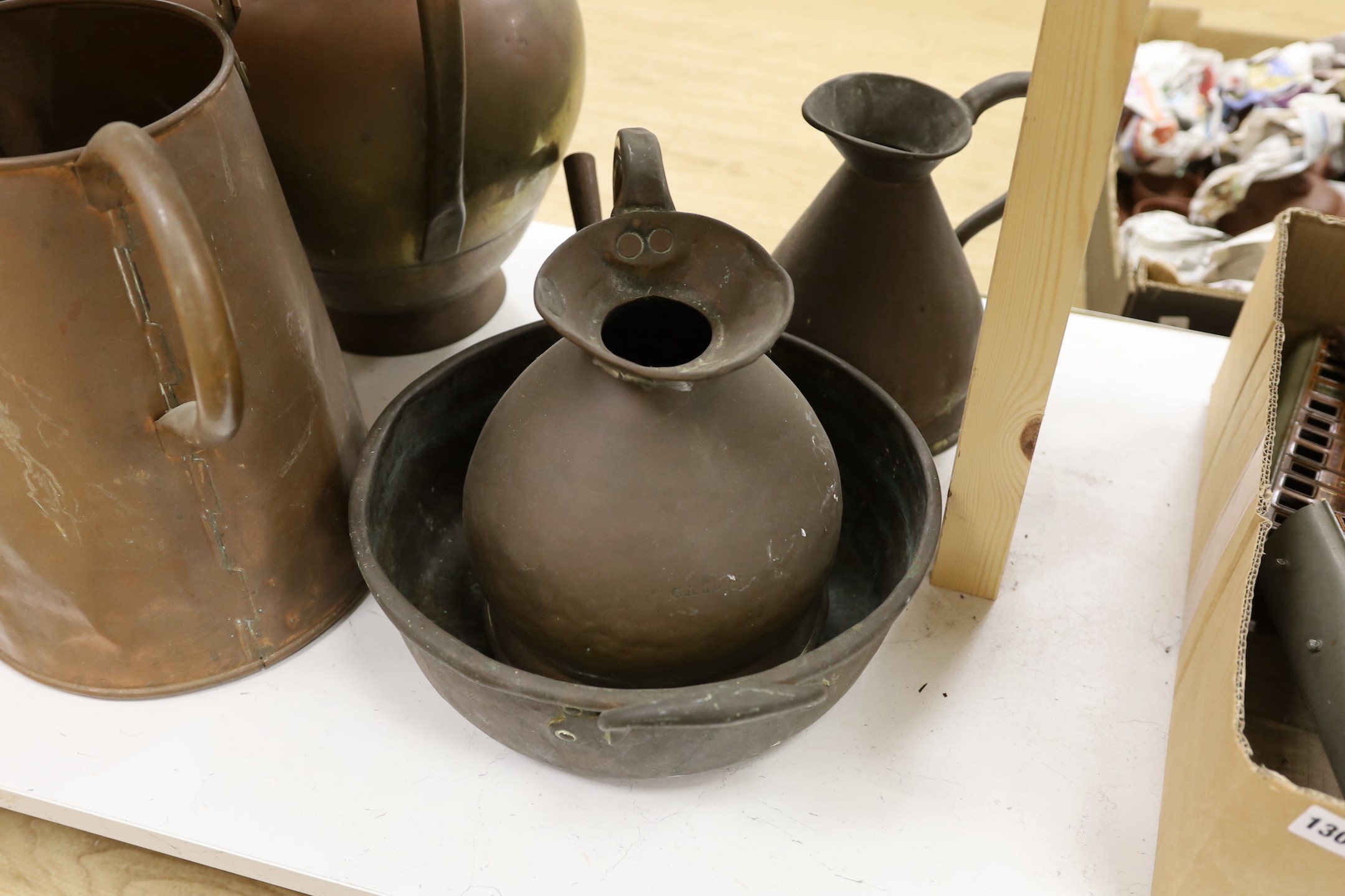 A selection of copper-wares, to include haystack measures